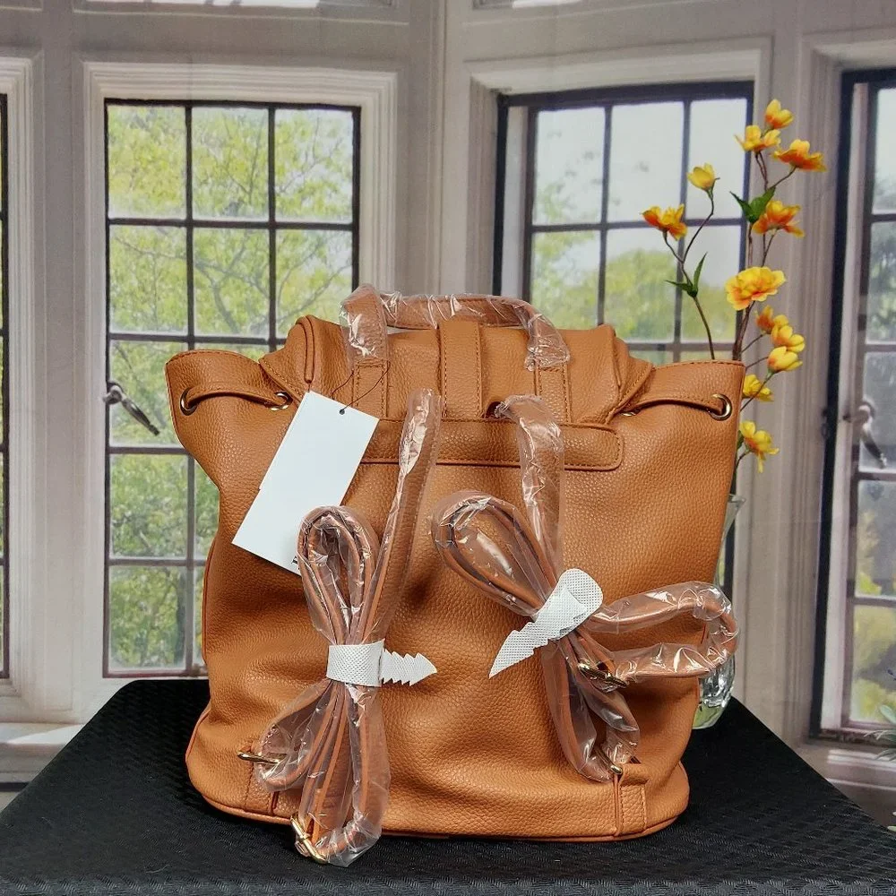 NWT JUSTFAB UTILITY BACKPACK (CASHEW)